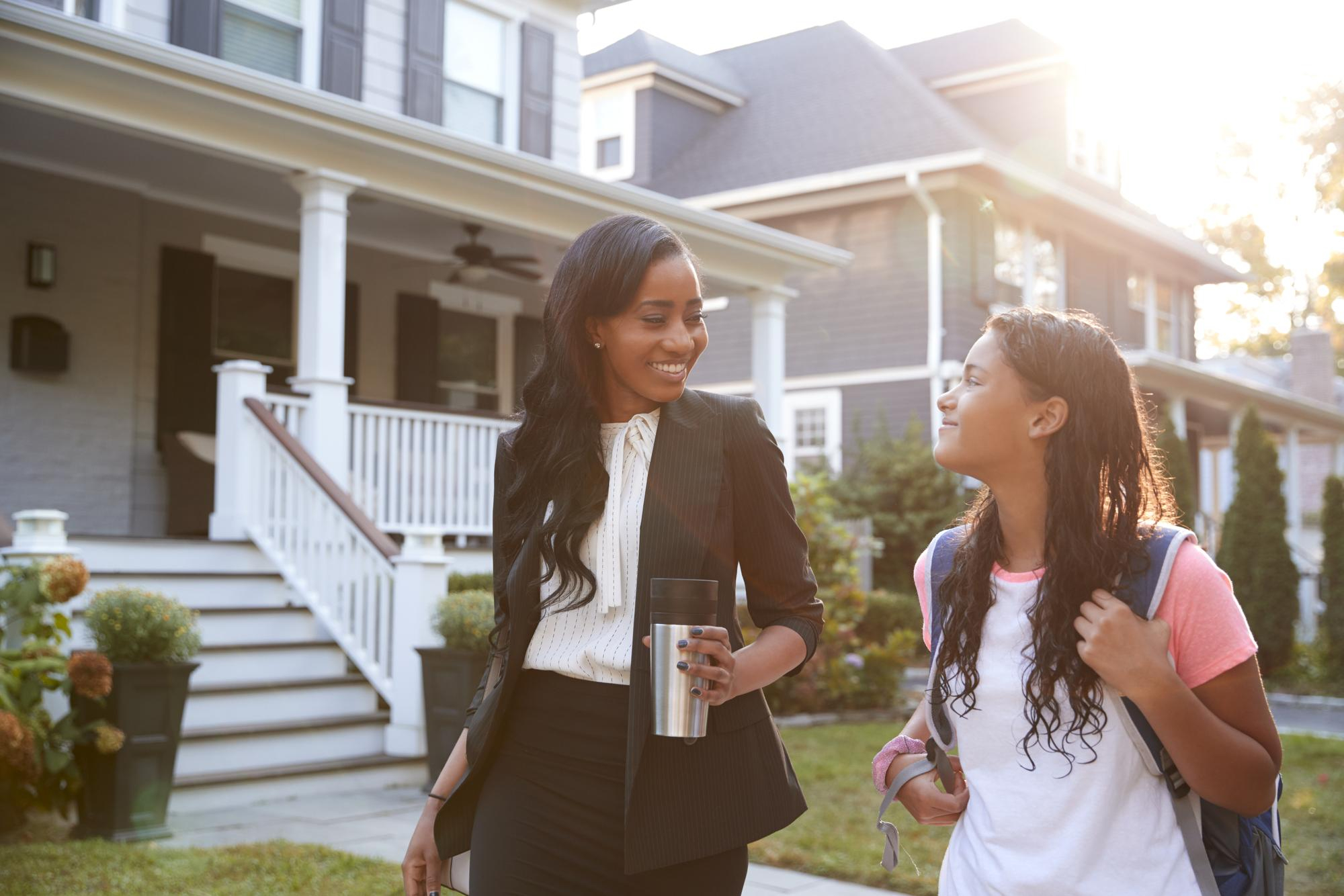 mother and daughter waling through denver Build-to-rent community