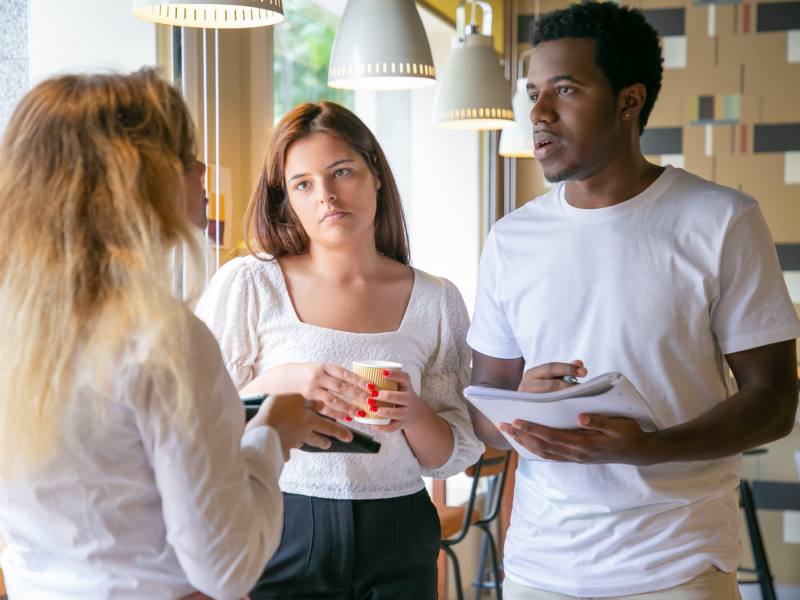 friends arguing over real estate business deal